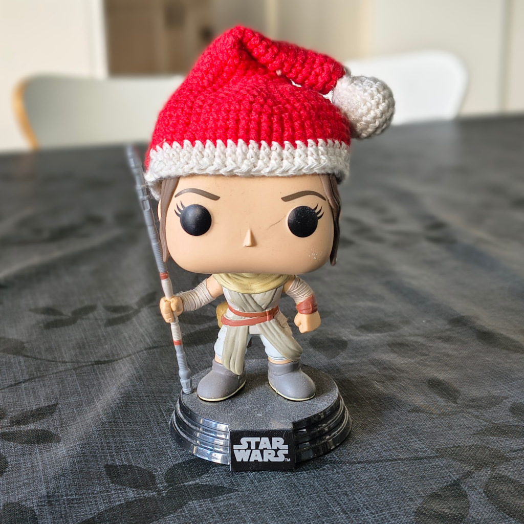 Christmas Rey with Santa hat in red and white crochet