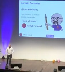 Horacio on stage at BDX I/O in 2025, in front of the screen showing his introduction slide
